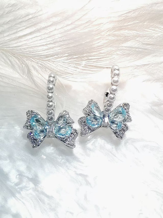 S925 - Pearly Bluey Bow Earring